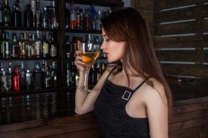 woman drinking alcohol